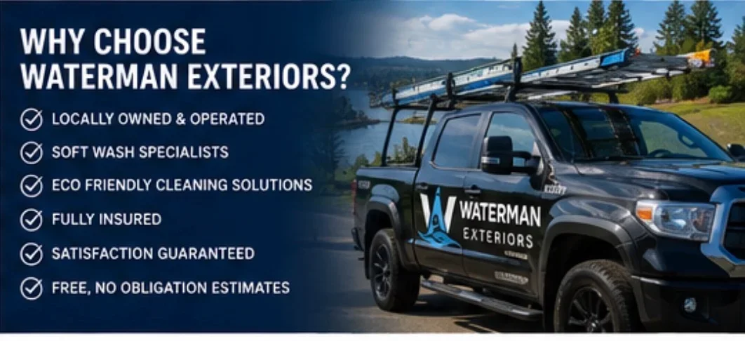 Black pickup truck with custom wrap, roof-mounted water tanks, and pressure washing equipment