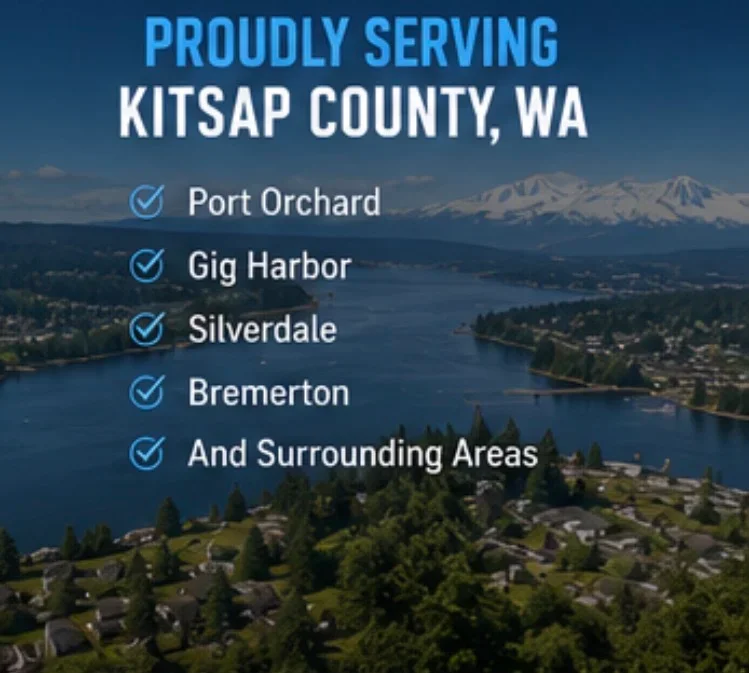 Aerial view of Kitsap County residential neighborhoods with mountains and water in background